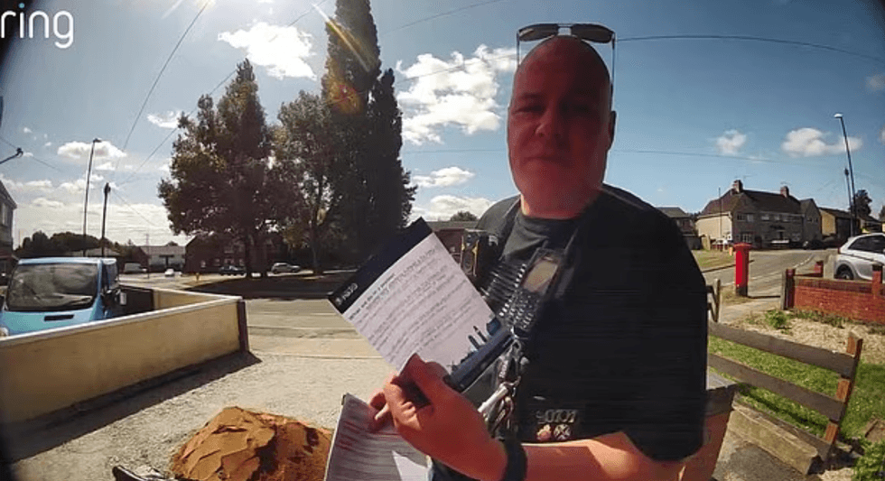 A police officer has been recorded on doorbell footage whilst on a visit to "warn" a resident about attending a protest against illegal migrants