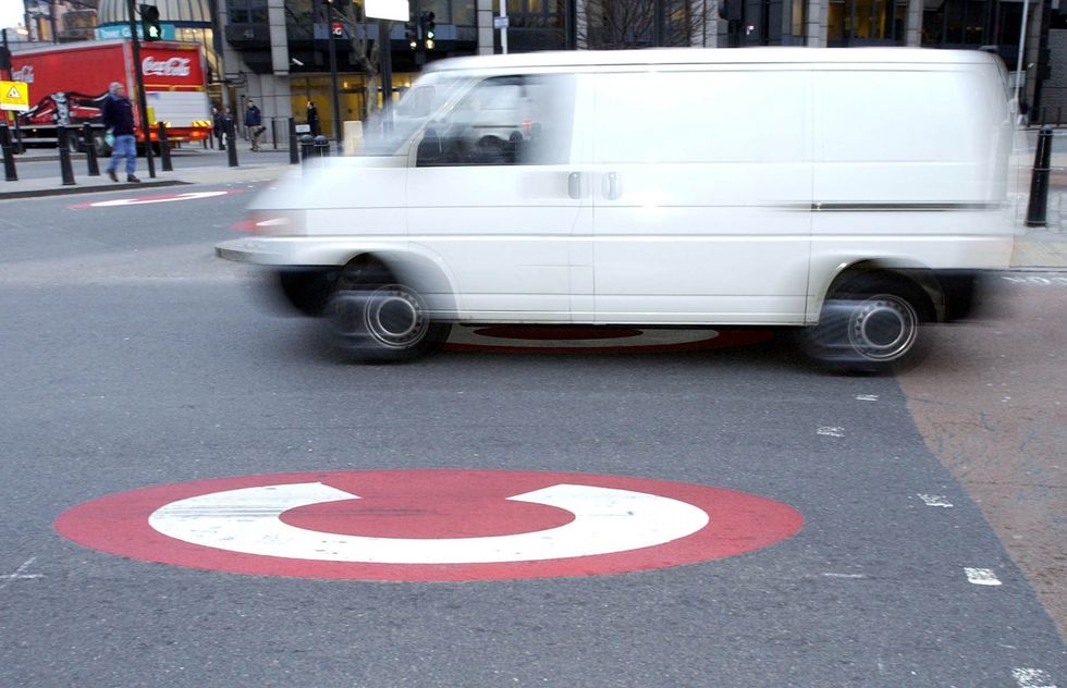 A van passes through the start of the Congestion Charge Zone