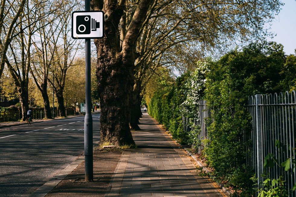 Camera sign on lampost