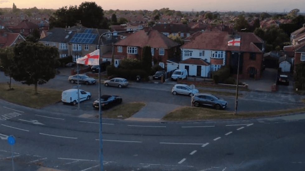 Flags flying on lamposts in York