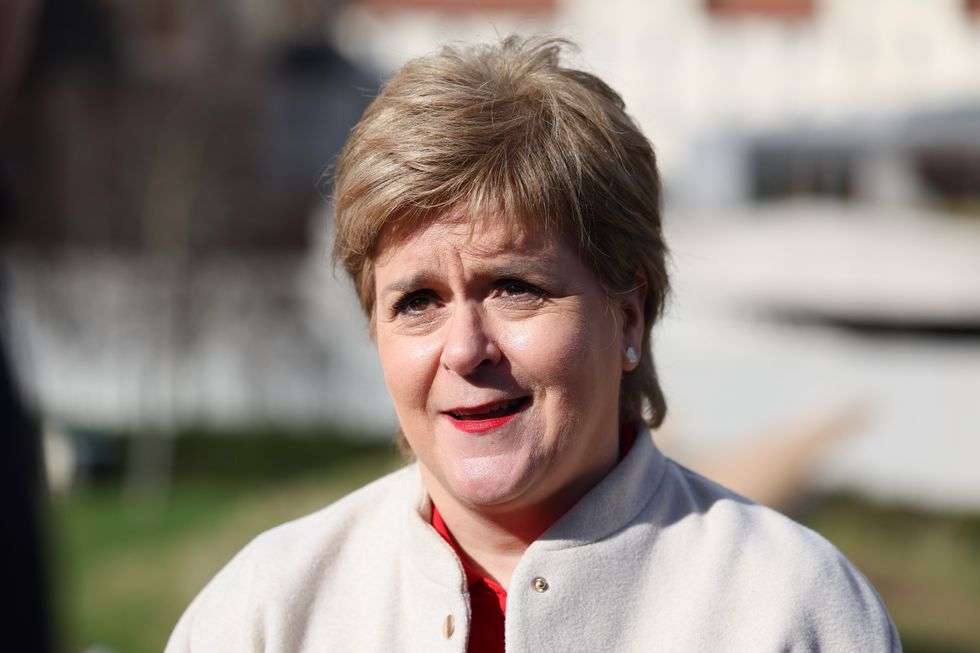 Former Scottish first minister Nicola Sturgeon speaking to media in Edinburgh following her announcement that she will not seek re-election to Holyrood next year