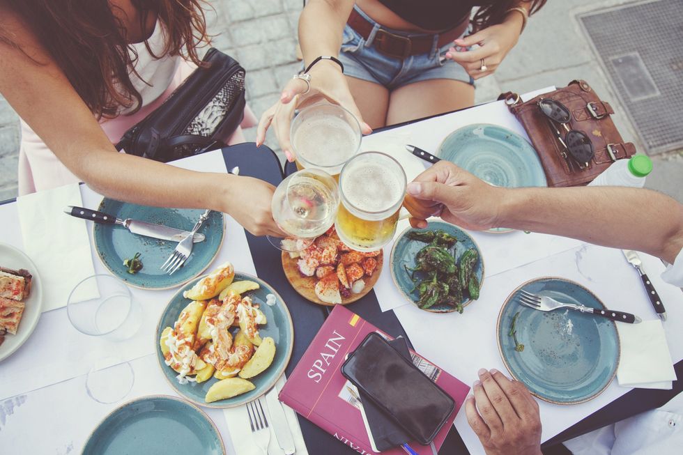 Friends enjoying tapas in Spain