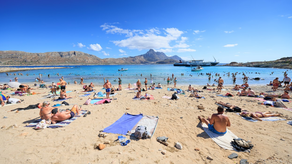 British tourist found dead in hotel swimming pool in holiday hotspot as three people arrested