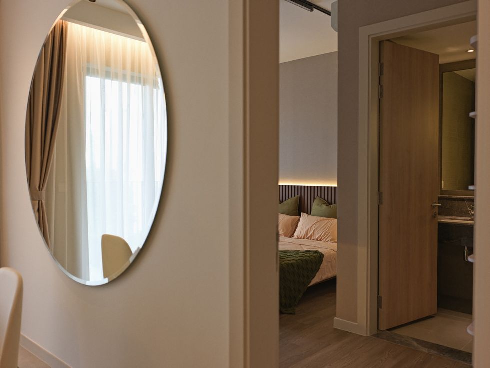 Large mirror on wall in hallway