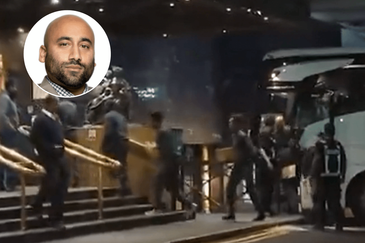 Migrants arriving at a hotel