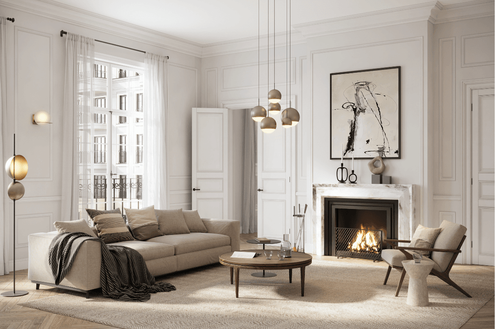 Modern living room decorated with range of lighting and a fire
