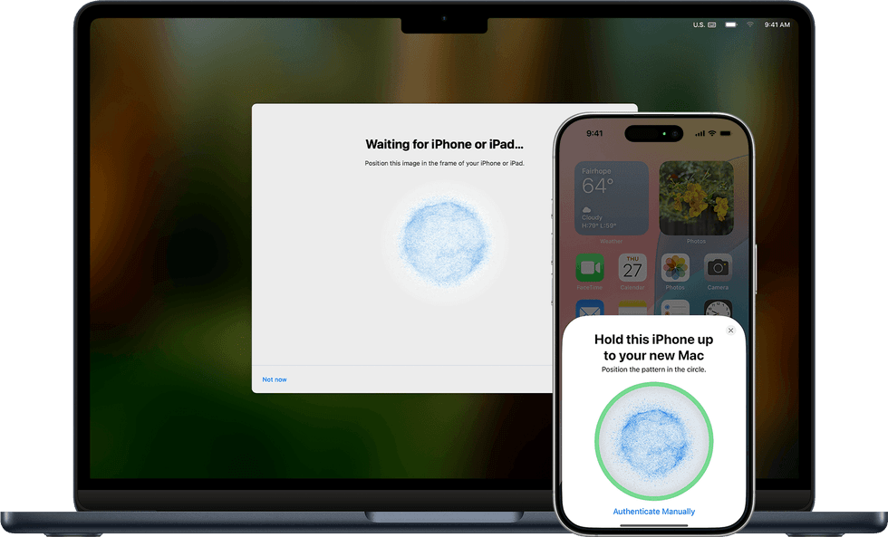 photograph of the macbook with an iPhone in the foreground showing the swirling pattern