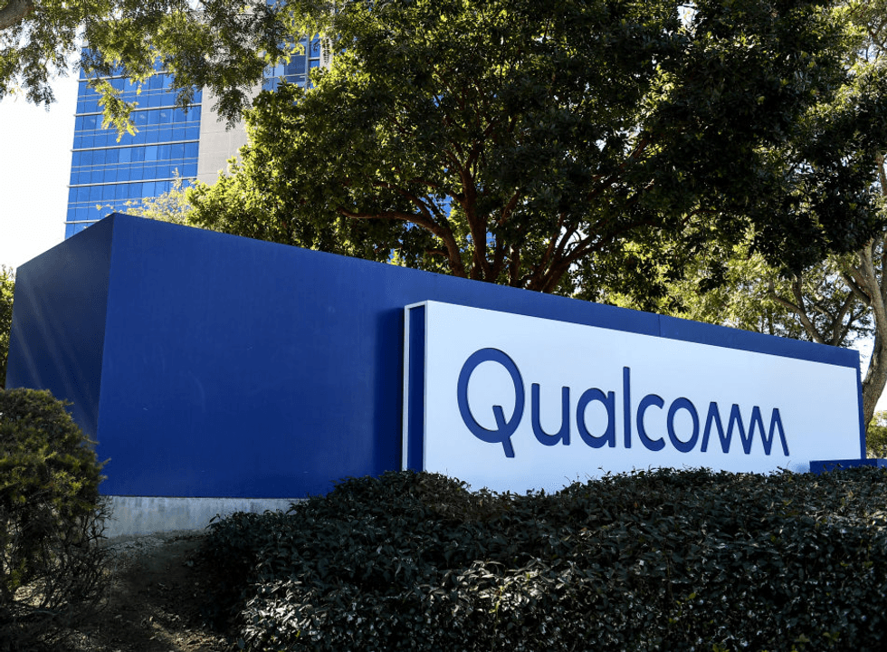 qualcomm logo pictured on a sign outside of the headquarters