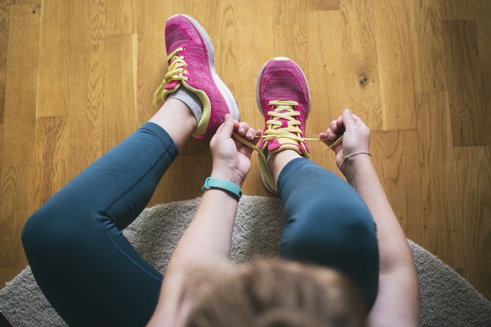 Runner putting on trainers