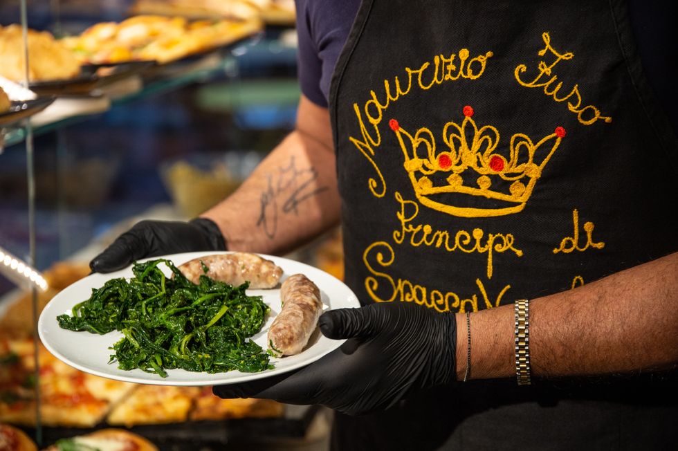 Sausage and turnip greens on plate
