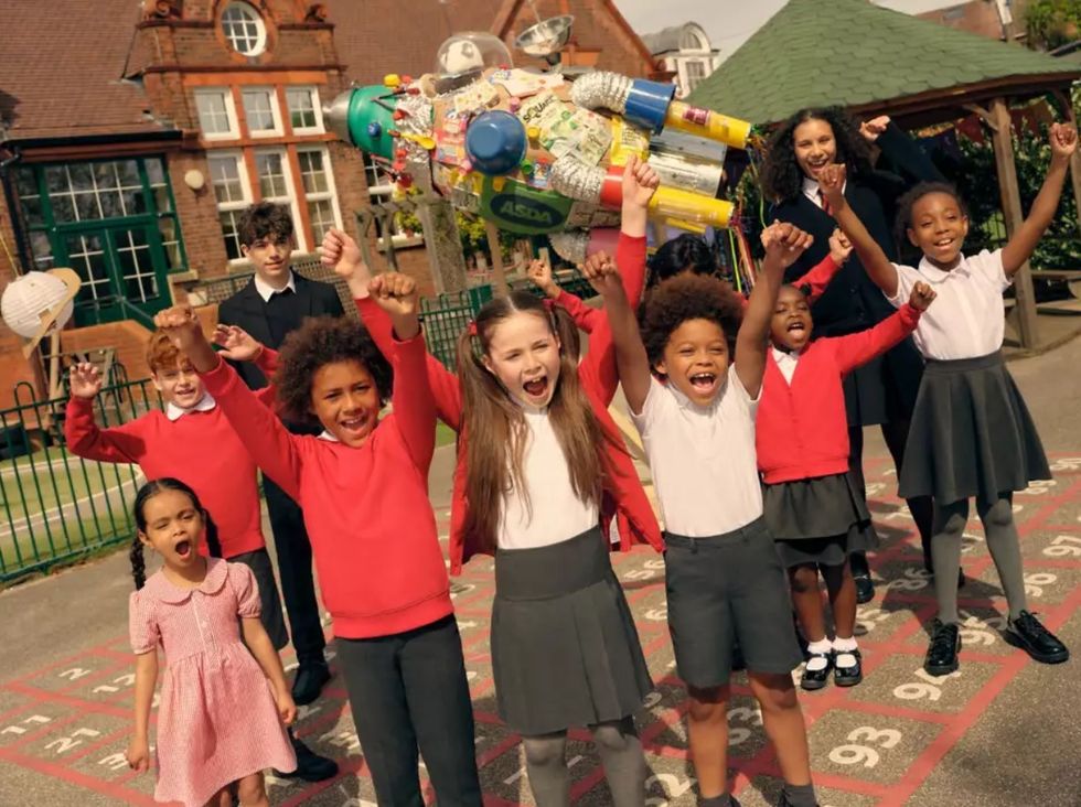 Schoolchildren wearing Asda's Back to School range