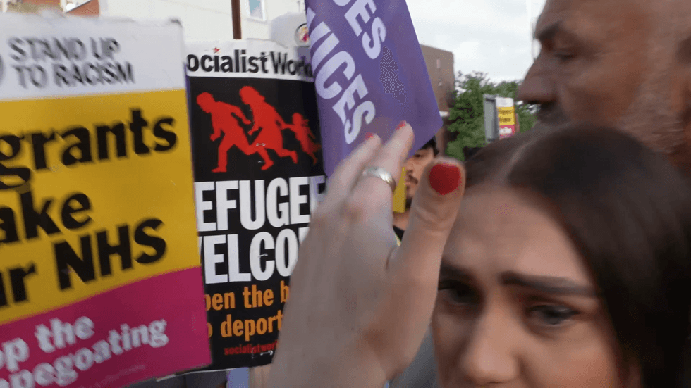 Sophie Reaper is swarmed by 'anti-racist' protesters