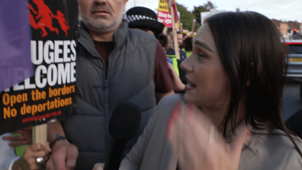 Sophie Reaper is swarmed by 'anti-racist' protesters