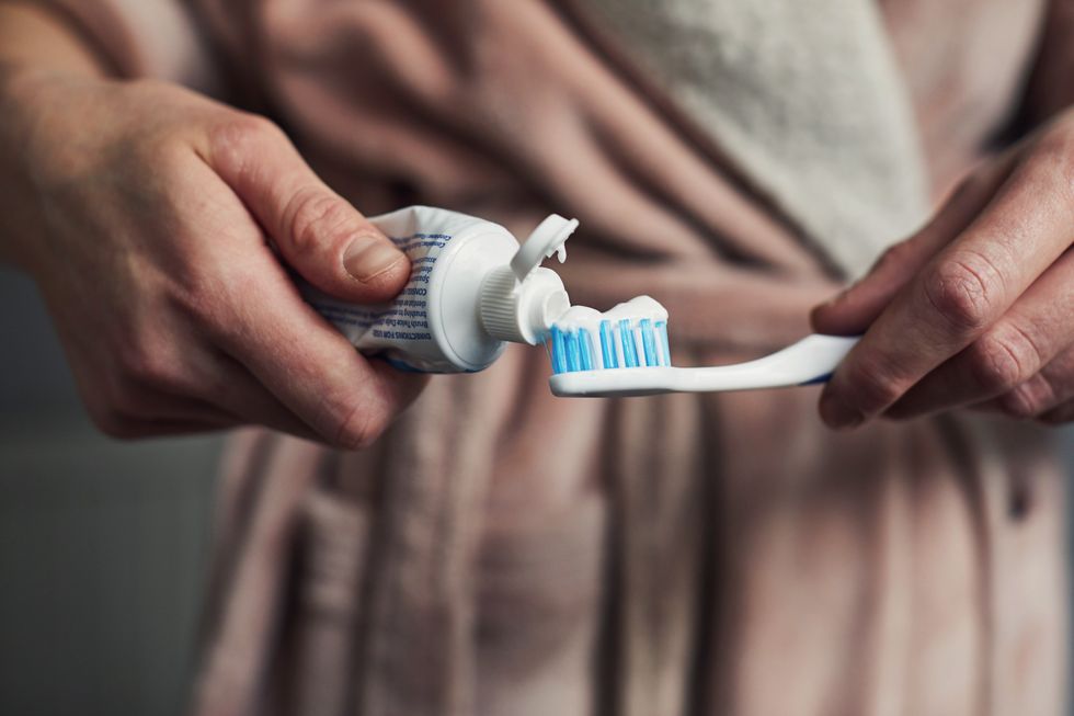 toothpaste on toothbrush