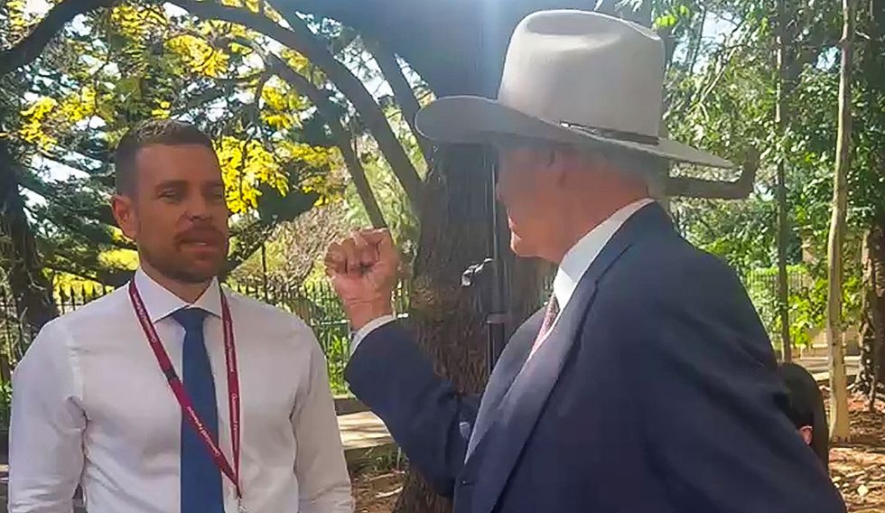 \u200bBob Katter argues with 9News reporter Josh Bavas during a press conference,