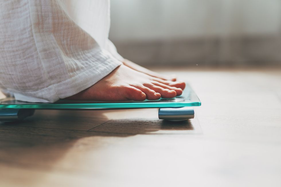 WOMAN ON SCALES