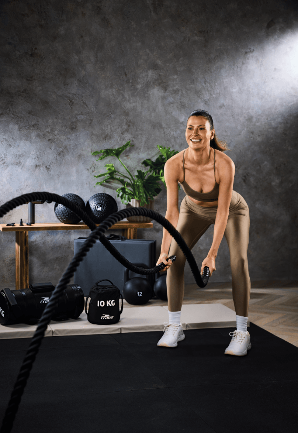 Woman working out using Aldi's latest fitness range