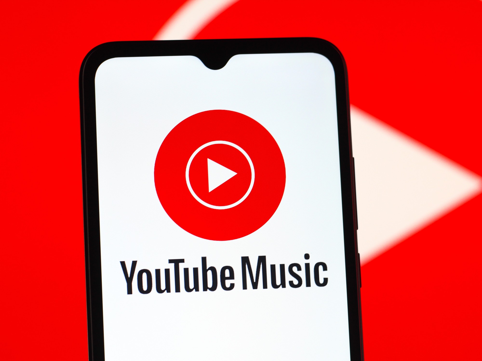 YouTube Music logo on smartphone